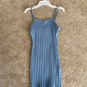 skintight blue ribbed dress